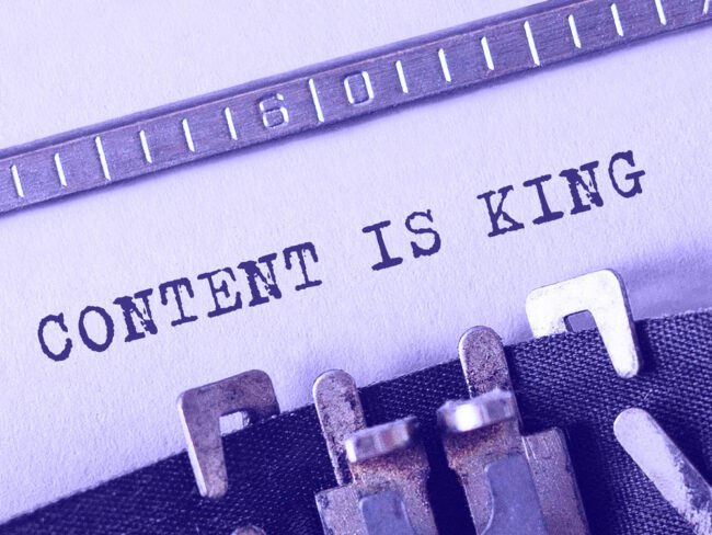 Text Content is King typed on retro typewriter Content is King